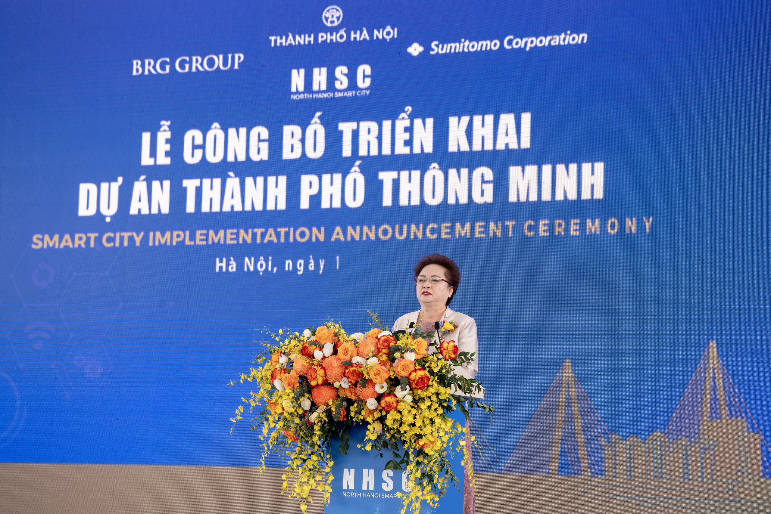 Madame Nguyễn Thị Nga, Chủ tịch Tập đoàn BRG, Phó Chủ tịch kiêm Tổng Giám đốc Công ty Thành phố Thông minh Bắc Hà Nội phát biểu tại sự kiện.